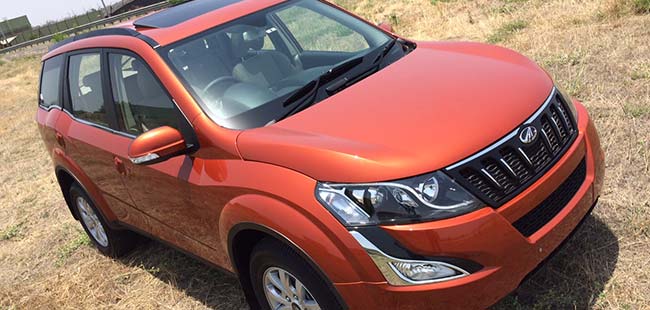 Mahindra xuv 500 images in red colour dress Mahindra xuv 500 images in red colour dress