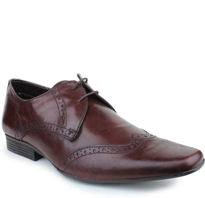 red tape shoes flat 50 off