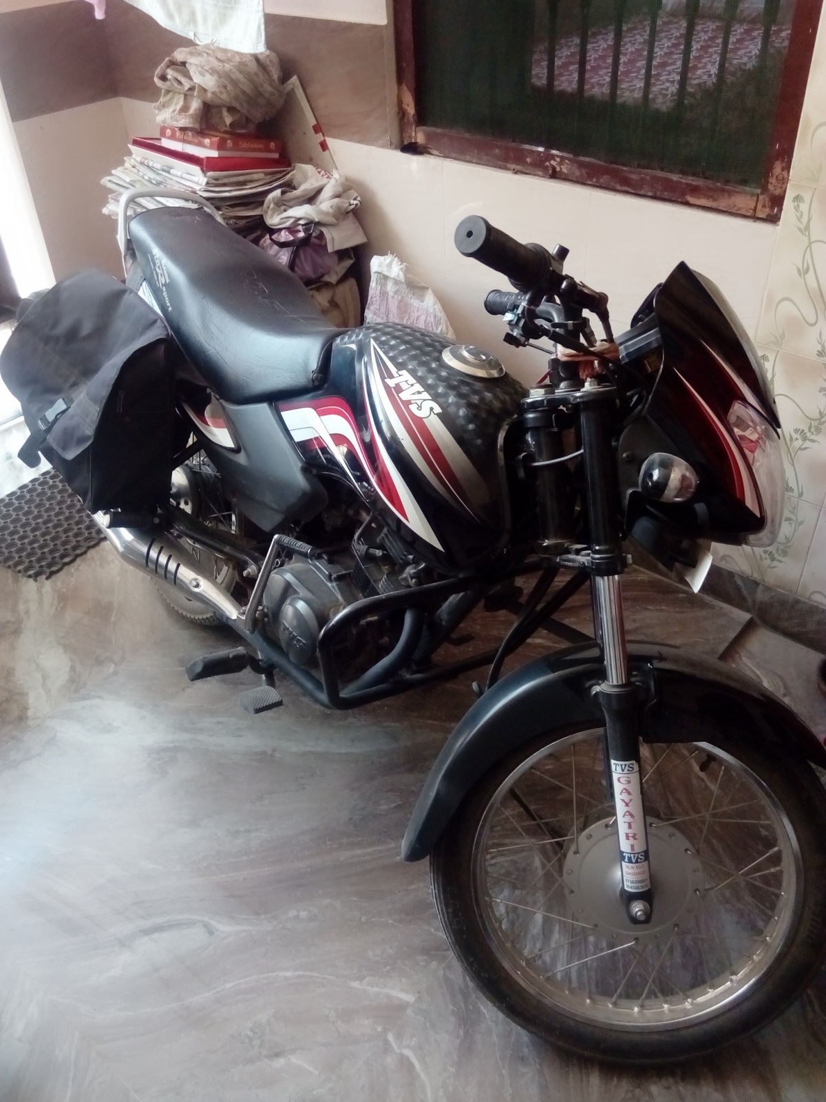 tvs sport 125cc mileage