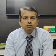 Dr. Kiran C Mhatre